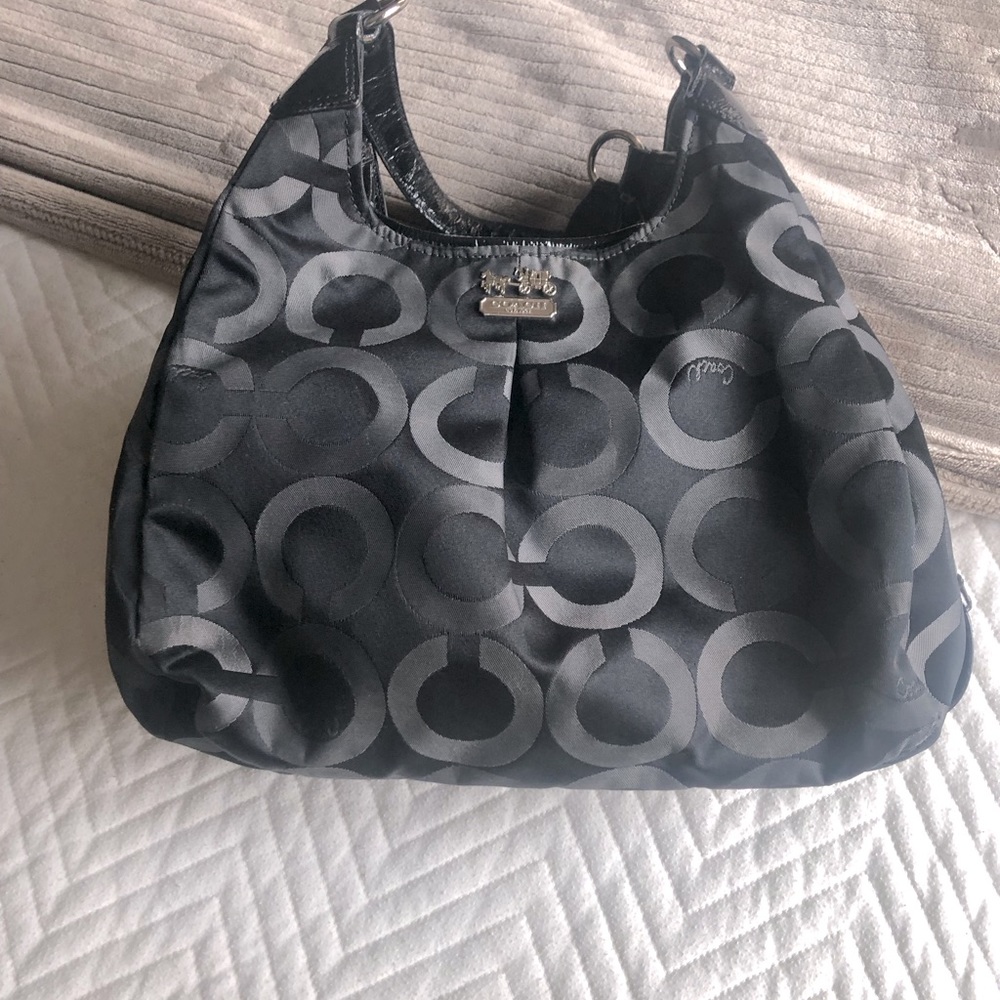 Coach purse in black and gray color